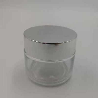 MSDS Clear 100g Glass Cream Jar With Shiny Silver Cap White Lid Mask Mud