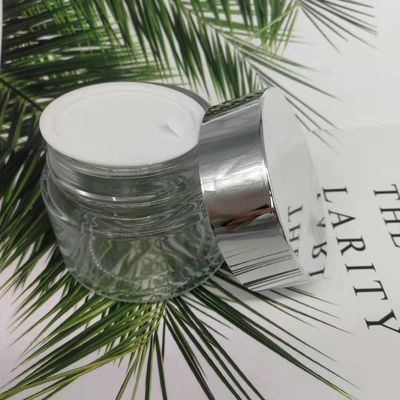 MSDS Clear 100g Glass Cream Jar With Shiny Silver Cap White Lid Mask Mud