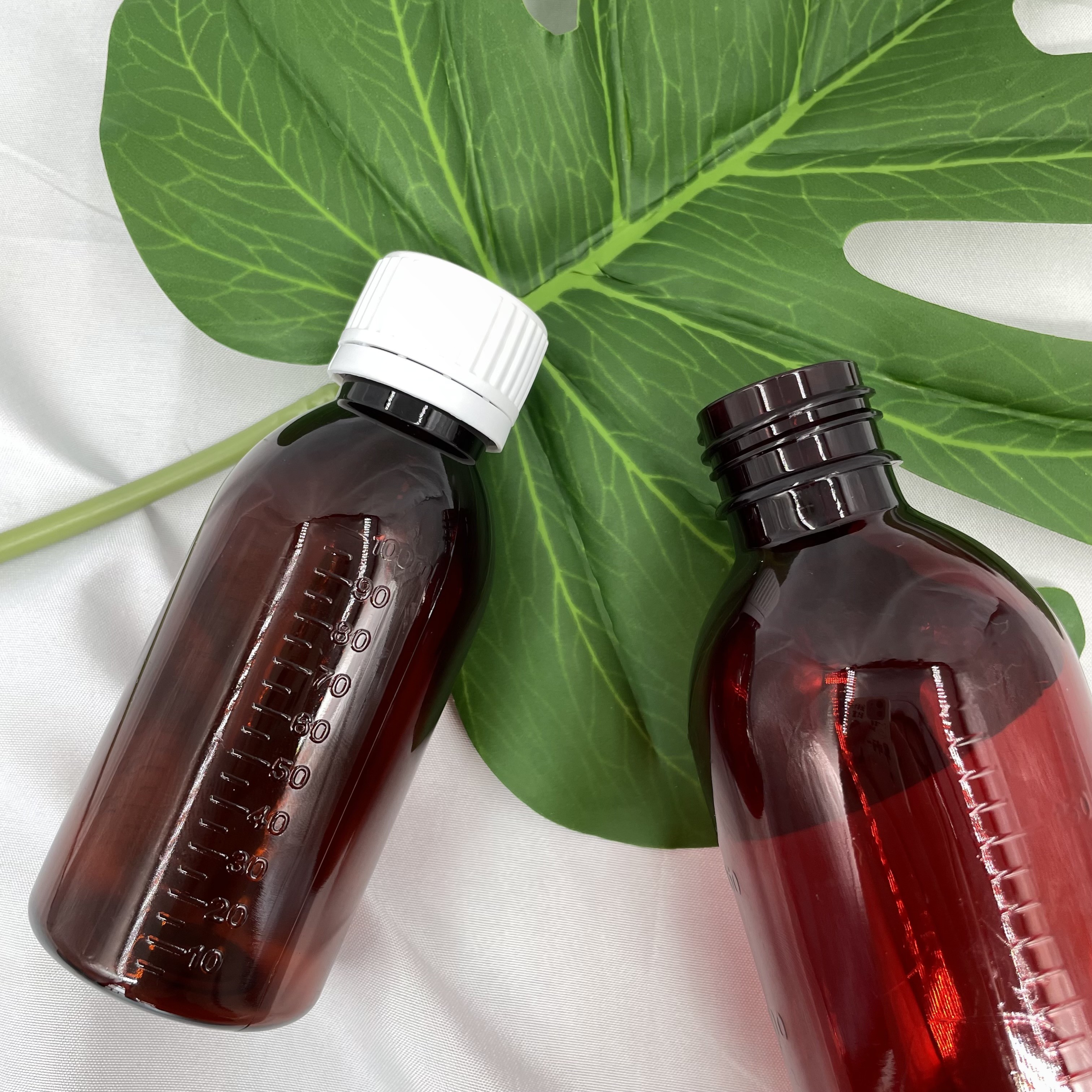 Empty Syrup 200ml Amber Plastic Bottles 100ml Round Shape With Scale Value